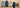 Motivbild: drei zusammengelegte Herren-Hoodies in Graumeliert, Dunkelblau und Sand nebeneinander auf hellem Holz, daneben eine zusammengelegte dunkelblaue Jeans und braune Ledersneaker